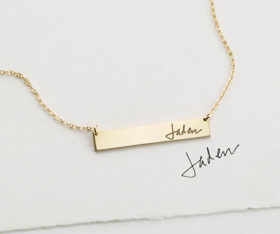 Gold custom handwriting necklace with handwritten name Jaden engraved on rectangular pendant