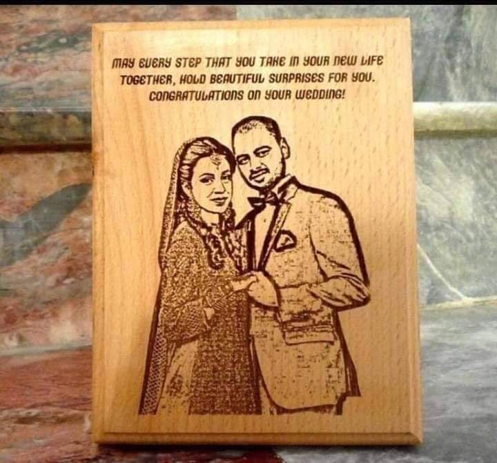 Wooden engraved photo frame for couples featuring a wedding portrait and congratulatory message