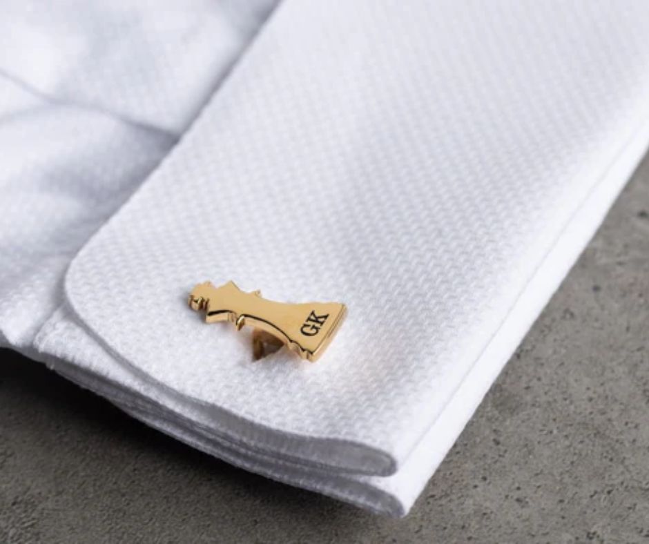 Gold chess piece cufflink on white textured shirt cuff unique chess lover gifts