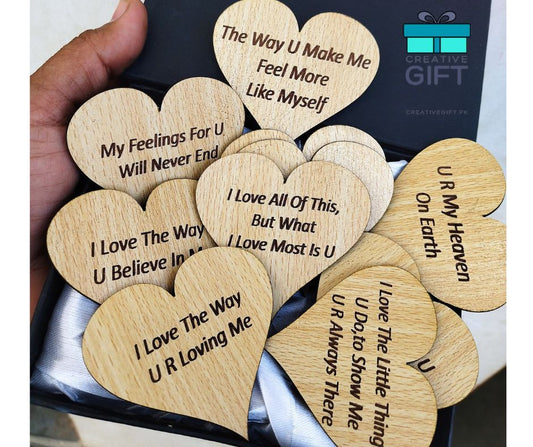 10 reasons why I love you box with wooden heart-shaped messages expressing love and affection