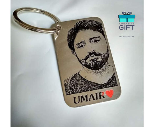 Custom photo metal keychain with engraved portrait and name Umair in silver finish