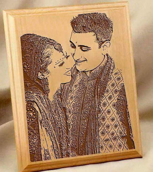 Engraved photo frame for couples featuring a detailed portrait of a smiling couple in traditional attire