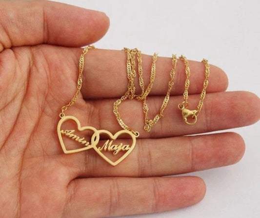 Gold heart-shaped name locket for couples with personalized engraved names on a delicate chain