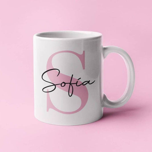 White ceramic custom initial name mug with large pink S and name Sofia in black script